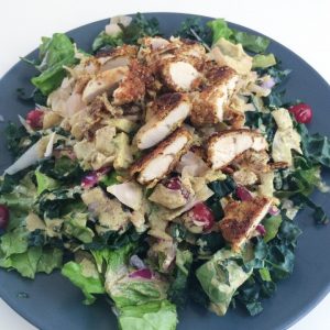 Coconut Breaded Chicken and Cranberry over Kale and Romaine Salad